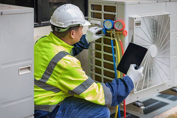 Professional Hvac technician working in Falls City, OR